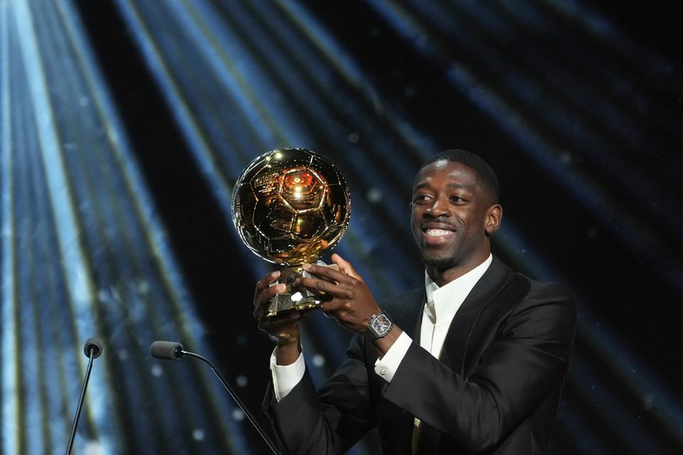 Paris Saint-Germain's Ousmane Dembélé receives the 2025 Men's Ballon d'Or